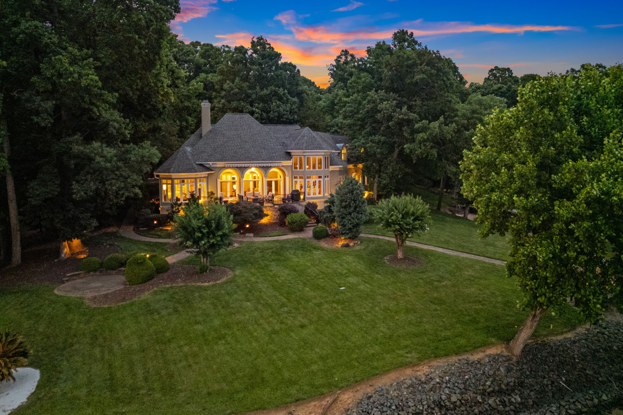 The residence and its Lake Wylie shoreline at twilight