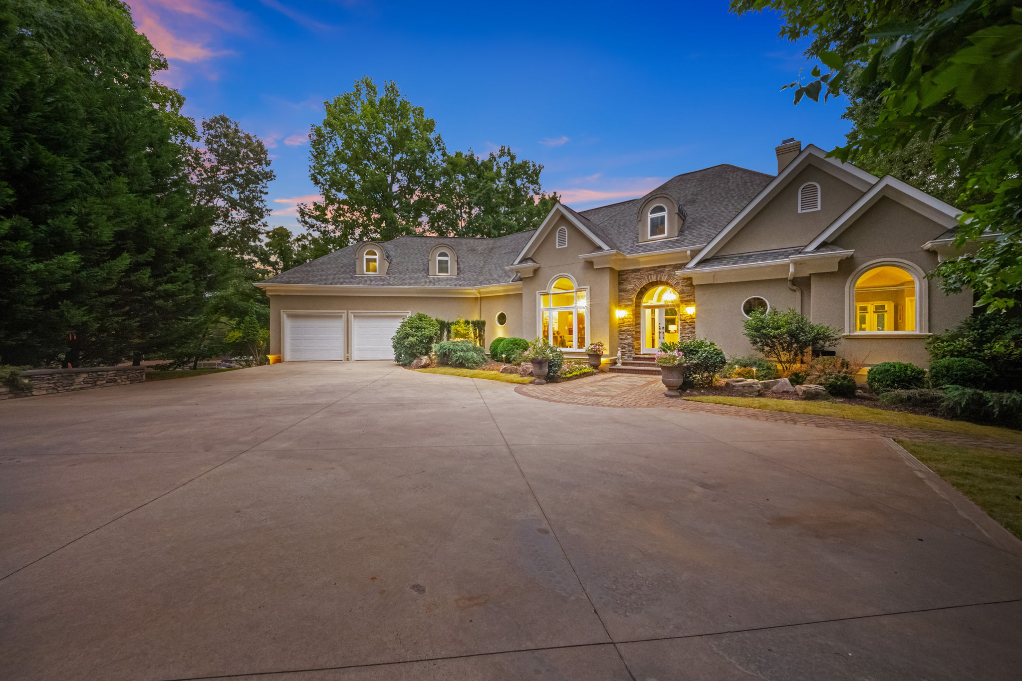 2161 Windy Oaks Road illuminated at sunset